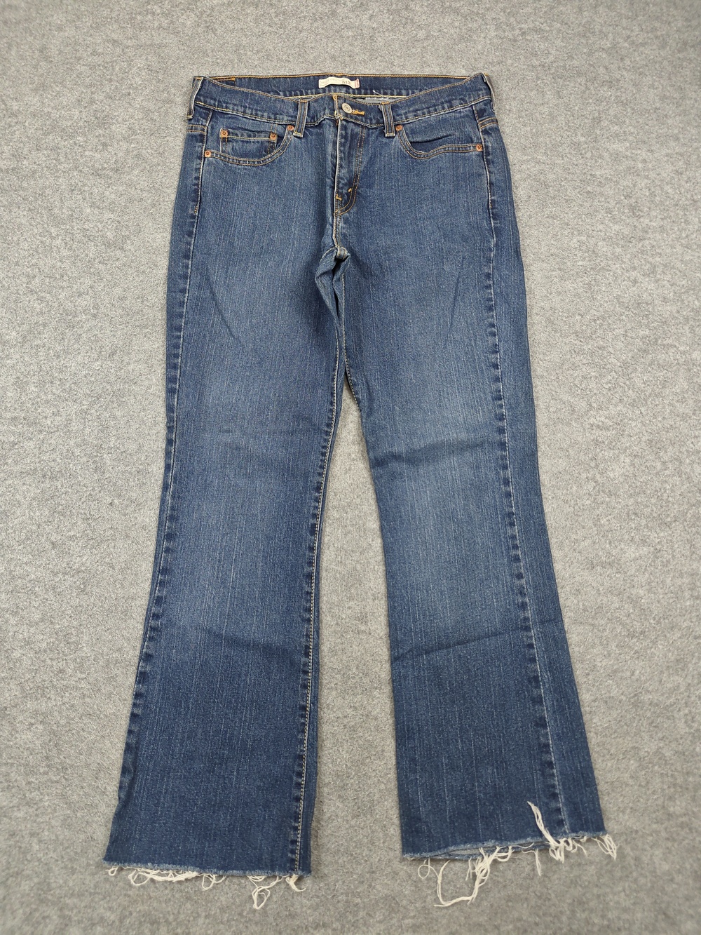 Levi's Jeans Womens 32x28 Blue Bootcut 515 Medium Wash Frayed Raw Hem Distressed